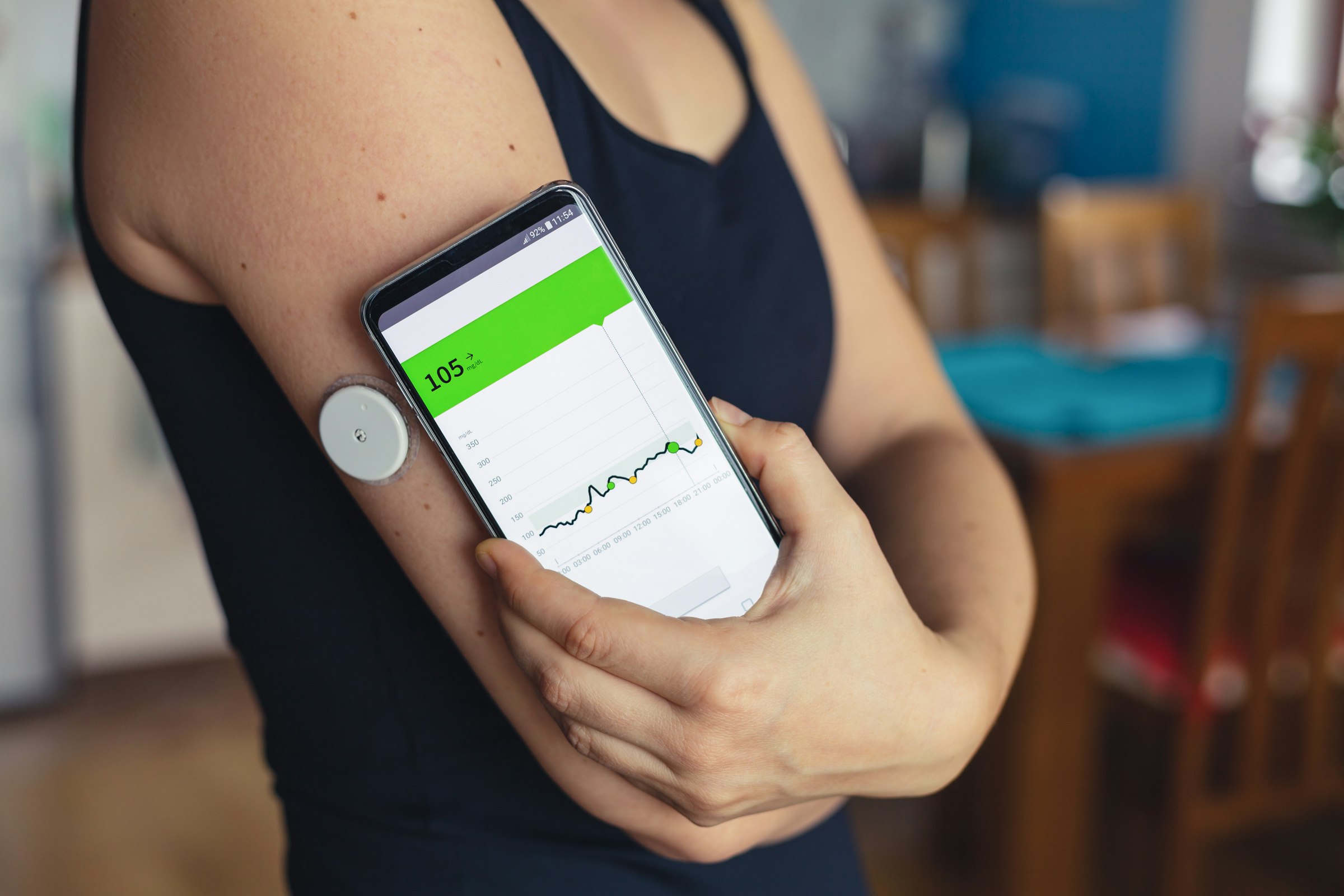 woman-with-continuous-glucose-monitor